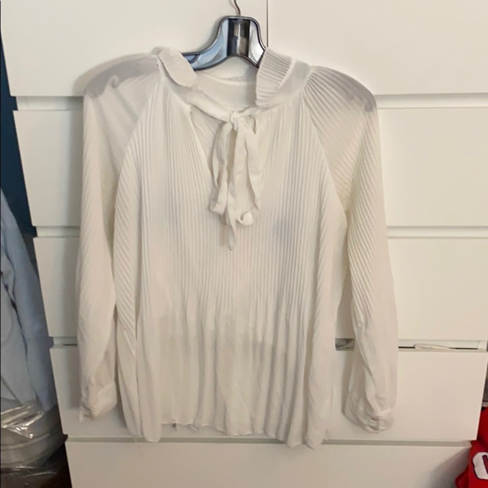 Long sleeved white blouse